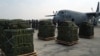 TNI menggunakan Pesawat Hercules C-130 mengirimkan bantuan kemanusiaan kepada Palestina pada Jumat (29/3) di Lanud Halim Perdanakusuma, Jakarta. (VOA)