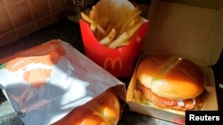 FILE - McDonald's Crispy Chicken Sandwiches and fries are pictured in New York, March 30, 2021. 