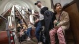 People take cover at metro station during a Russian rocket attack in Kyiv, Ukraine, May 29, 2023. Explosions have rattled Kyiv during daylight as Russian ballistic missiles fell on the Ukrainian capital.