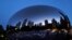 FILE - Chicago's skyline is reflected on Anish Kapoor's stainless steel sculpture Cloud Gate, also known as "The Bean," in the city's Millennium Park, May 25, 2023. 