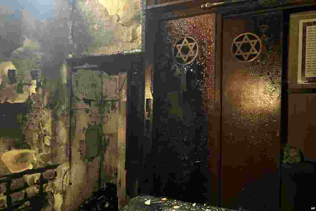 A synagogue is seen after a man armed with a knife and a metal bar is suspected of having set the building on fire, in Rouen, France. French police shot and killed the suspect.