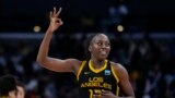 FILE — Los Angeles Sparks forward Chiney Ogwumike celebrates a 3-pointer during a WNBA basketball game against the Phoenix Mercury in Los Angeles, California, May 19, 2023. Ogwumike is a member of President Joe Biden's advisory council made up of Americans of African heritage.