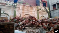 FILE - Debris remains from an Ahmadi mosque that was demolished by an angry mob May, 24, 2018, in Sialkot, Pakistan. Another Ahmadi place of worship was demolished by opponents in Lahore in September 2023.