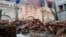 FILE - Debris remains from an Ahmadi mosque that was demolished by an angry mob May, 24, 2018, in Sialkot, Pakistan. Another Ahmadi place of worship was demolished by opponents in Lahore in September 2023.