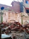 FILE - Debris remains from an Ahmadi mosque that was demolished by a mob on May, 24, 2018, in Sialkot, Pakistan. On July 27, 2024, unidentified gunmen killed an Ahmadi man in Gujaret, Pakistan, amid an increase in violence against the minority group.