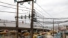 FILE - Electric wires are pictured in Ojuelegba district in Nigeria's commercial capital of Lagos, June 18, 2018. Nigerian authorities announced on April 3, 2024, a nearly 300% increase in electricity rates for some of its consumers.