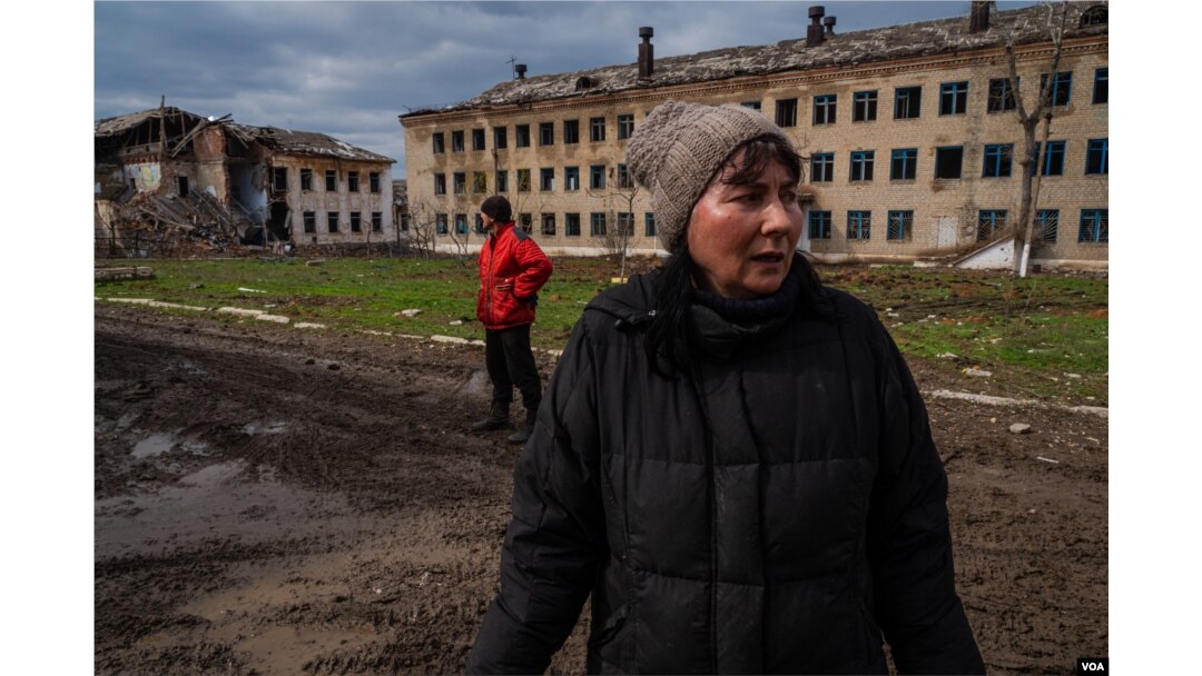 Angelina, 50, pictured April 4, 2023, says so few people are left in Siversk, Ukraine, that everyone now knows everyone else. (Yan Boechat/VOA)