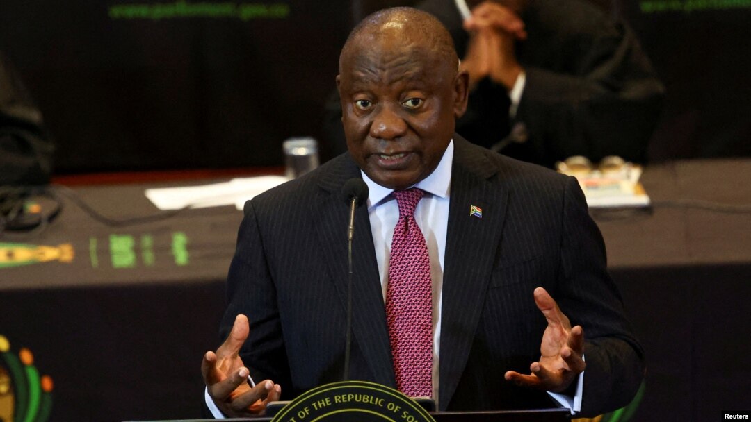FILE - South African President Cyril Ramaphosa responds to a parliamentary debate on his state of the nation address in Cape Town, South Africa, Feb. 16, 2023.