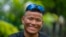 FILE - Nepalese mountain guide Tenjen Sherpa, 35, smiles during an interview with the Associated Press in Kathmandu, Nepal, Aug. 9, 2023. Tenjen Sherpa and American climber Gina Marie Rzucidlo are reported missing after avalanches struck Tibet’s Mount Shishapangma, Oct. 7, 2023. 