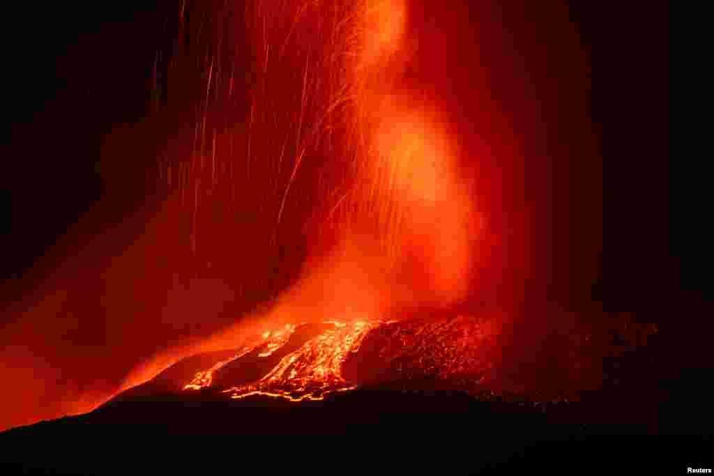 Lava rises from Mount Etna, Italy.