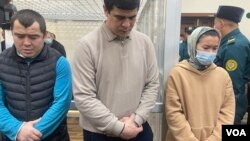 From left, Ahmet Smetullayev, Azamat Turdanov and Lolagul Kallykhanova were among six defendants released with suspended sentences. Bukhara, Uzbekistan, Jan. 31, 2023. (VOA)