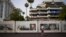 A person walks along the Croisette ahead of the Cannes film festival, in Cannes, southern France, May 12, 2024. The 77th edition of the film festival runs from May 14 until May 25. 