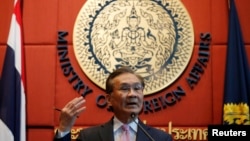 FILE - Thailand's Foreign Minister Don Pramudwinai gestures during a news conference at the Ministry of Foreign Affairs in Bangkok, Thailand, July 1, 2016.