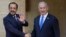 Israeli Prime Minister Benjamin Netanyahu, right, and Cypriot President Nikos Christodoulides shake hands before their meeting at the presidential palace in the capital Nicosia, Cyprus, Sept. 3, 2023.