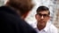 Britain's Prime Minister and Conservative Party leader Rishi Sunak meets with nighttime economy representatives in central London, June 22, 2024 as part of a campaign event in the build-up to the July 4 general election. 