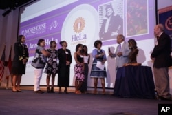 FILE - Bust unveil in honor of the donor of the immortal HeLa cells at Morehouse School of Medicine's 20th annual women's conference. (Morehouse School of Medicine via AP Images)