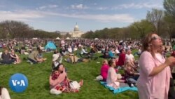 Americans Watching Partial Solar Eclipse in Washington DC