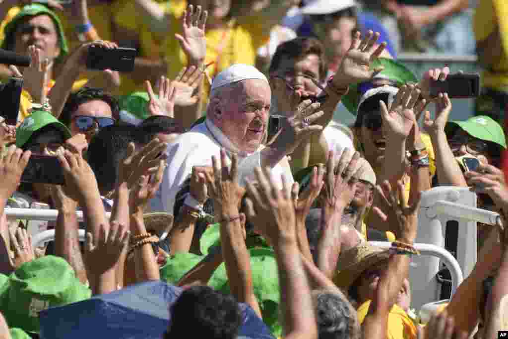 Pope Francis meets with thousands of World Youth Day volunteers at Passeio Marítimo in Algés, just outside Lisbon, Portugal.