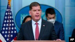 FILE - Labor Secretary Marty Walsh speaks during a briefing at the White House in Washington, May 16, 2022.