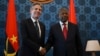 U.S. Secretary of State Antony Blinken, left, and Angolan President Joao Lourenco shake hands during their meeting at the Presidential Palace in Luanda, Angola, Jan. 25, 2024.