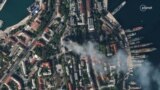 A satellite image shows smoke billowing from a Russian Black Sea Navy headquarters after a missile strike, as Russia's invasion of Ukraine continues, in Sevastopol, Crimea, Sept. 22, 2023. (Planet Labs PBC/Handout via Reuters)