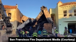 Firefighters work through the rubble of a house that exploded in San Francisco on Feb 9, 2023.