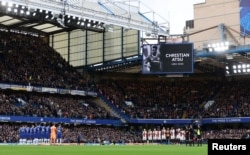 FILE - A moment of silence is held in memory of Christian Atsu, during a Premier League match between Chelsea and Southampton, at Stamford Bridge, London, Britain, Feb. 18, 2023.