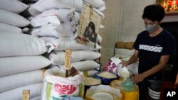 A worker prepare rice for sale in in Bangkok, Thailand, on Thursday, Aug. 10, 2023. Countries worldwide are scrambling to secure rice after a partial ban on exports by India cut supplies by roughly a fifth