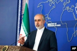 FILE - Iranian Foreign Ministry spokesperson Nasser Kanaani speaks in Tehran, Iran, in this Aug. 11, 2022, photo released by the Iranian Foreign Ministry.