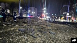 This handout photo released by Telegram Channel of Belgorod Region Governor Vyacheslav Gladkov shows the site of the crater after an explosion in Belgorod, Russia, April 21, 2023.