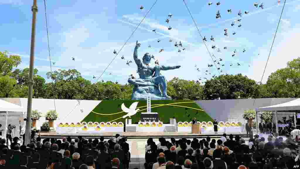 Pigeons are released during a peace prayer ceremony at the Peace Park in Nagasaki, Japan, during ceremonies to mark the 79th anniversary of the atomic bombing of the city. 