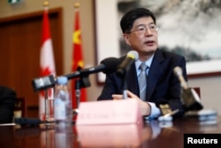 FILE - China's ambassador to Canada, Cong Peiwu, speaks at the Chinese Embassy in Ottawa, Canada, Nov. 22, 2019.