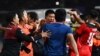 Players and officials react as a fight breaks out on the sidelines of the men's football final match between Thailand and Indonesia during the 32nd Southeast Asian Games (SEA Games) in Phnom Penh on May 16, 2023.