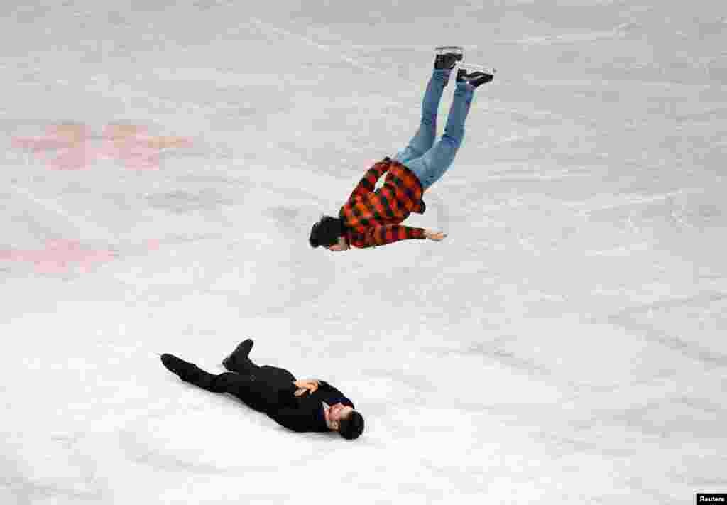 Canada&#39;s Keegan Messing backflips over Canada&#39;s Maxime Deschamps after the Gala Exhibition at the ISU World Figure Skating Championships 2023 in Saitama , Japan.