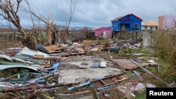 Debris lies around the foundation of a destroyed house after the passage of Hurricane Beryl, on the island of Carriacou, Grenada, July 3, 2024.