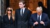 FILE - Barron Trump, center, stands with his mother, former first lady Melania Trump, left, and father, former U.S. President Donald Trump, at a funeral in Palm Beach, Florida, Jan. 18, 2024. On Friday, Barron Trump withdrew as a delegate to the 2024 Republican Party convention. 