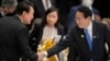 FILE - Japan's Prime Minister Fumio Kishida, right, shakes hands with South Korea's President Yoon Suk Yeol during the ASEAN-East Asia Summit in Phnom Penh, Cambodia, on Nov. 13, 2022. A Japan-ASEAN summit begins Saturday in Tokyo.