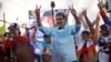 (FILE) Venezuelan President Nicolas Maduro flashes victory hand signs at supporters during a pro-government rally, in Caracas, Venezuela, Aug. 17, 2024. 