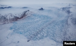 The Kronebreen glacier is seen in Kongsfjord, near Ny-Aalesund, April 5, 2023.