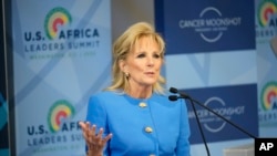 FILE - First lady Jill Biden speaks as she hosts spouses of African leaders as part of the US-Africa Leaders' Summit in Washington, Dec. 14, 2022. 