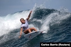 Canada's Sanoa Dempfle-Olin, a surfer representing Canada, trains in Teahupo'o, Tahiti, July 25, 2024.