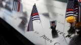 A picture is placed on the National September 11 Memorial & Museum, on the 22nd anniversary of the September 11, 2001 attacks on the World Trade Center, in New York City.