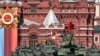 FILE - A Soviet-era E-34 tank leads the column of Russian armored vehicles in Red Square during the Victory Day military parade in Moscow, May 9, 2023, marking the 78th anniversary of the end of World War II.