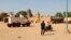 FILE - United Nations forces patrol the streets of Timbuktu, Mali, on Sept. 26, 2021. 