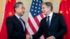 FILE - U.S. Secretary of State Antony Blinken, right, greets China's top diplomat Wang Yi in Bali on July 9, 2022. The two met again Feb. 18, 2023, in Munich, Germany, where Blinken told Wang the violation of U.S. airspace by China’s surveillance balloon must never occur again. 