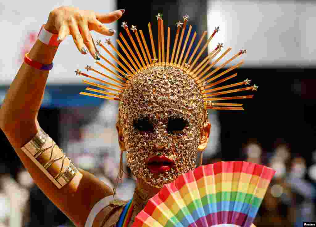 A participant marches during the Tokyo Rainbow Pride parade, celebrating advances in LGBTQ rights and calling for marriage equality, in Tokyo, Japan.