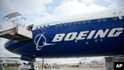 FILE - A Boeing 777X airplane is shown at the Paris Air Show in Le Bourget, north of Paris, France, June 19, 2023. 