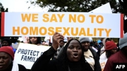 FILE - Demonstrators from the Coalition of Botswana Christian Churches chant slogans against homosexuality as they march in Botswana, on July 22, 2023. The group is voicing opposition to the newest amendment bill promoting gay rights, which was introduced April 17, 2024.