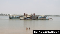 FILE - A ferry is shown on March 18, 2024, along the Mekong River where a proposed canal is planned.