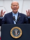 US President Joe Biden speaks during a barbecue with active-duty military service members and their families on the South Lawn of the White House, July 4, 2024, in Washington. 